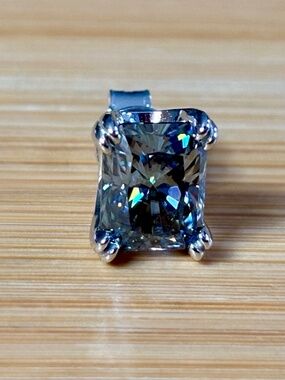 6ctw gray radiant Moissanite studs in sterling mountings with double claws!